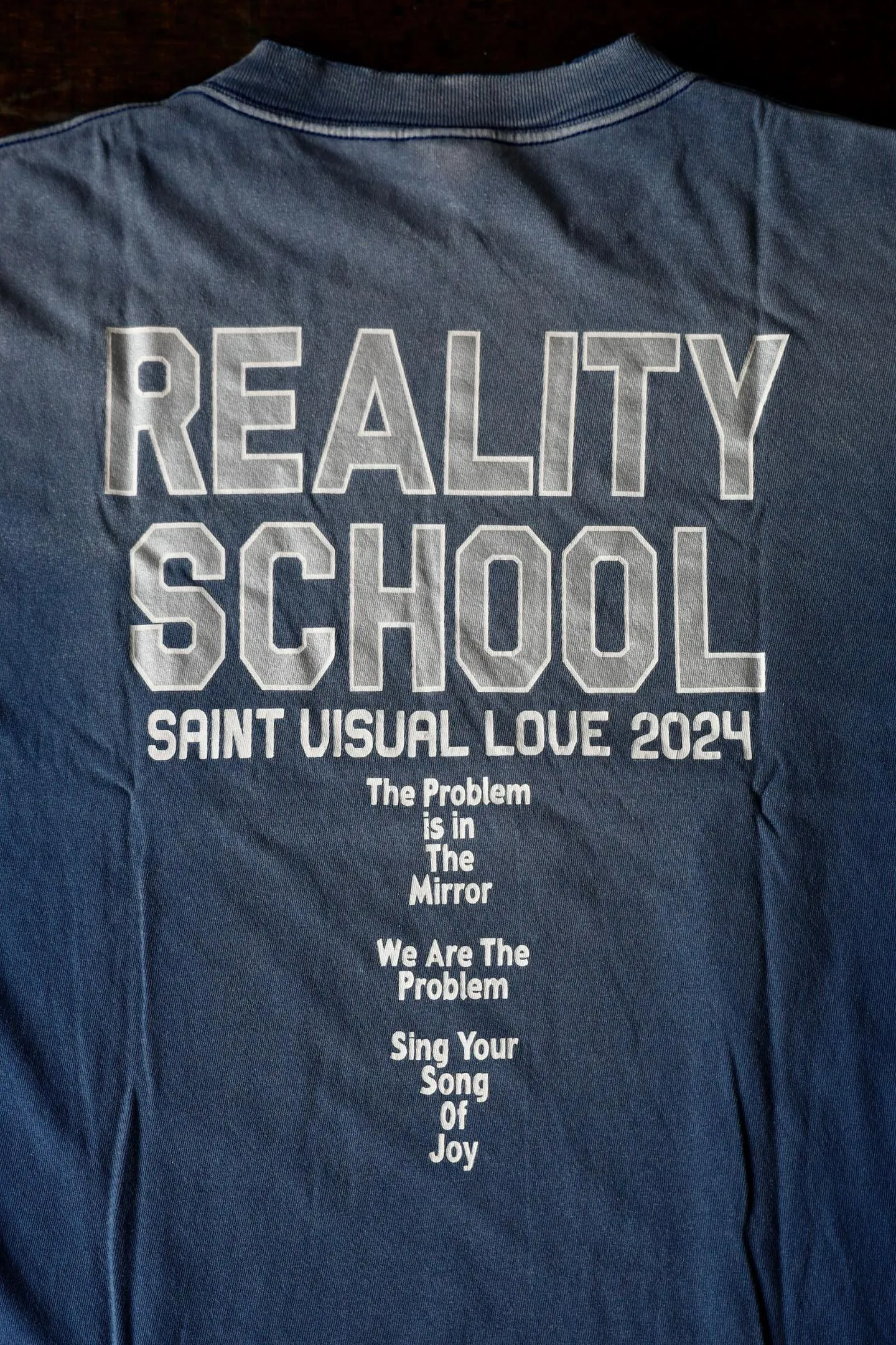 SAINT Mxxxxxx REALITY SCHOOL SS_TEE/NVY slogan distressed short-sleeves, washed blue S-XL, garment dyeing, horse fade, ultra-complex shearing and destruction treatment, correct version, cylindrical fabric, customized original consistent main mark/wash mark, original consistent silver powder printing, distressed treatment